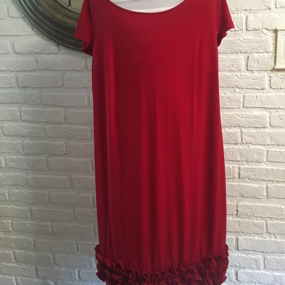 En Focus red dress with rose petals at the hem